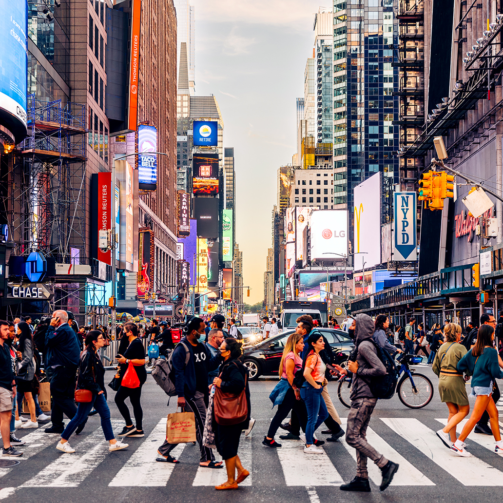 People crossing the street near Times Square, Manhattan, New York City, USA
